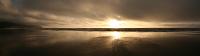 IMG_5221 panorama beach sunset through clouds artsy ocean